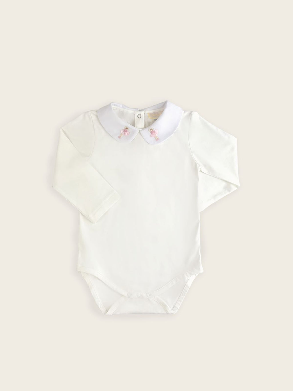 A classic pique bodysuit in white with a ballerinas embroidered onto the collar.