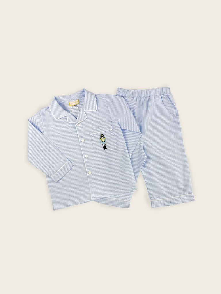 Boys blue and white striped long sleeve pyjamas with danish soldier on pocket.