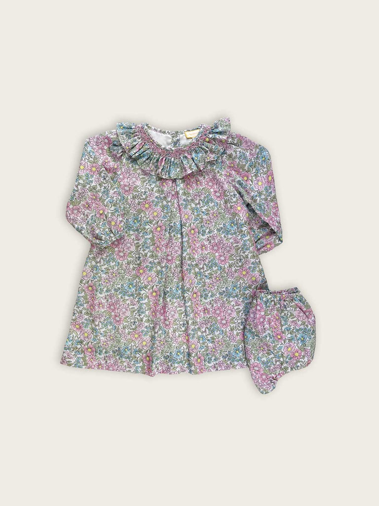Floral children's dress with matching bloomers, featuring a frilled collar with hand smocking.