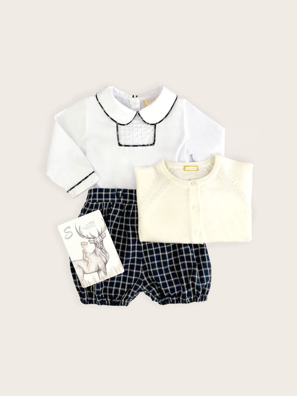 French navy check baby boy bloomers with a peter pan collared shirt featuring check piping 