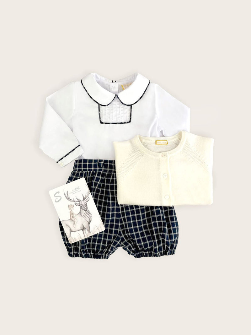 French navy check baby boy bloomers with a peter pan collared shirt featuring check piping paired with a winter white cardigan